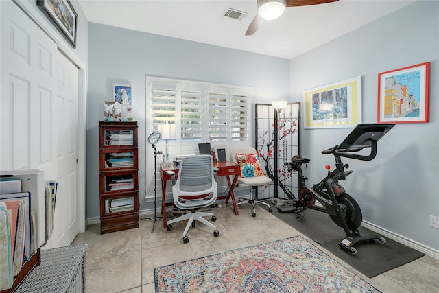 office area with ceiling fan and light tile patterned floors