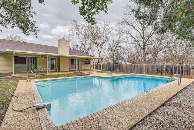 view of pool featuring a patio area and ceiling fan