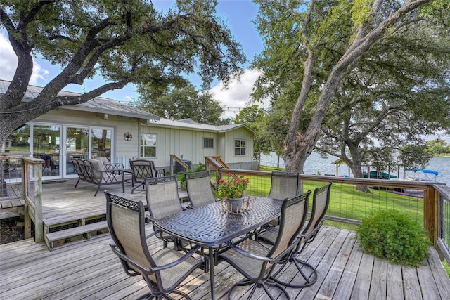 wooden deck featuring a yard