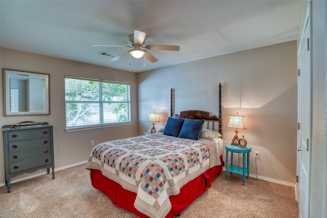 bedroom featuring ceiling fan and light colored carpet