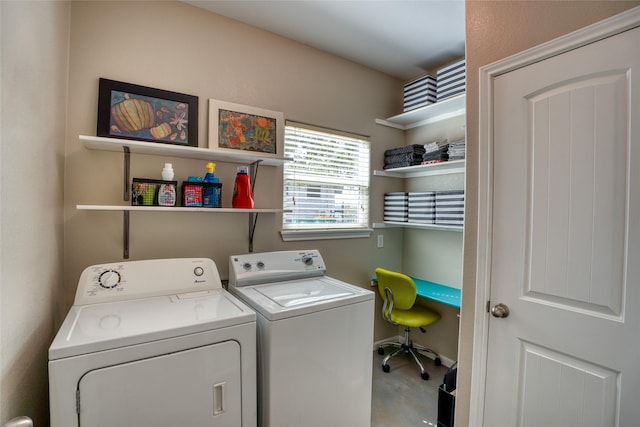 clothes washing area featuring washing machine and clothes dryer