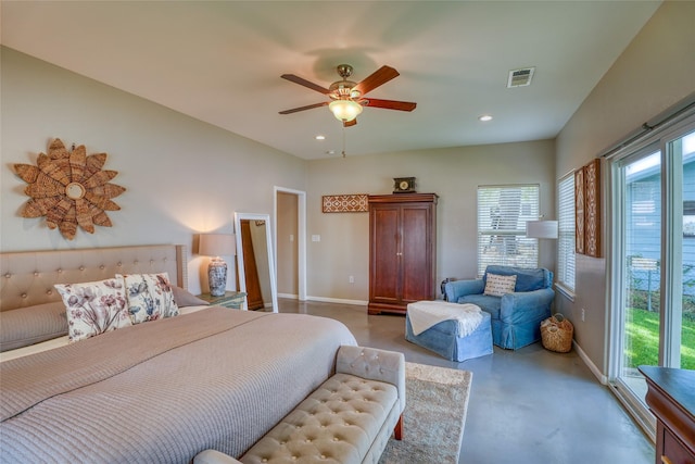 bedroom with ceiling fan and concrete floors