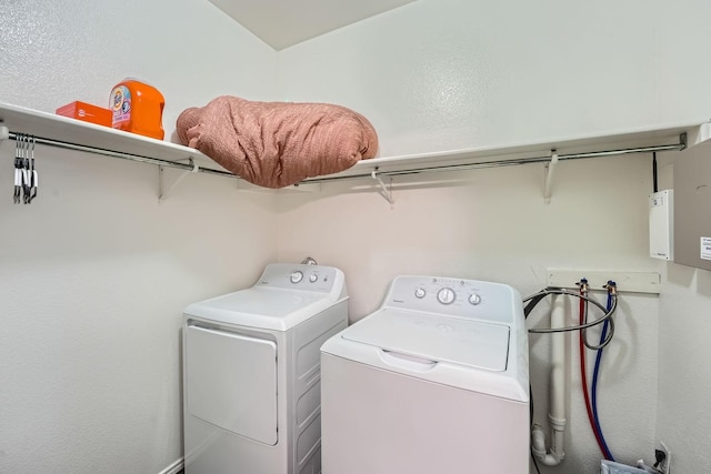 laundry area with washing machine and dryer