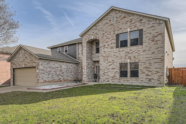 front of property featuring a front yard and a garage