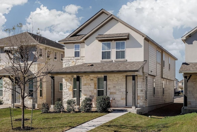 view of front of property featuring a front lawn