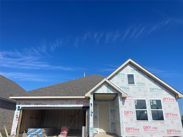 property in mid-construction featuring a garage