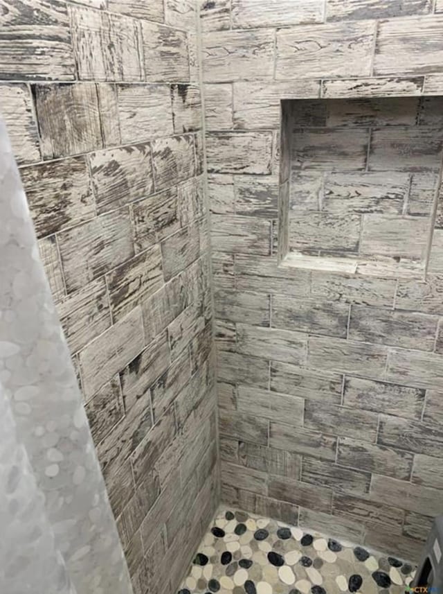 bathroom with walk in shower