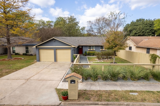 ranch-style home with a garage and a front lawn