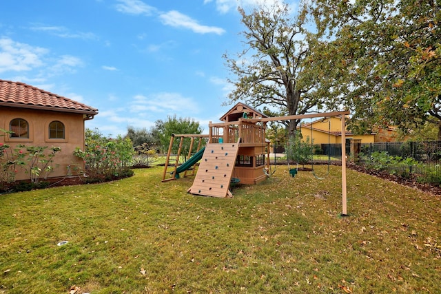 view of playground featuring a yard