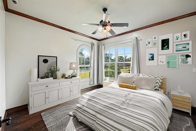 bedroom with ceiling fan, dark wood-type flooring, and crown molding