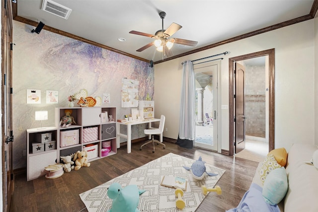 game room with dark hardwood / wood-style flooring, ornamental molding, and ceiling fan