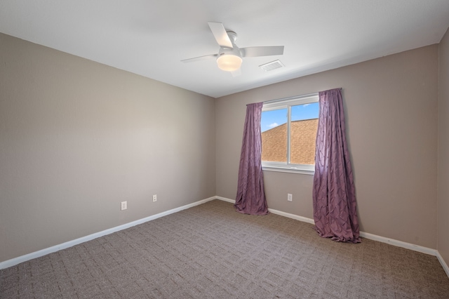 carpeted empty room with ceiling fan