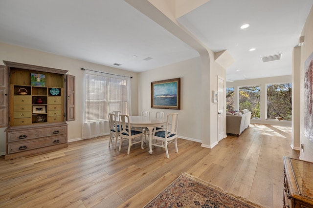 dining space featuring light hardwood / wood-style floors