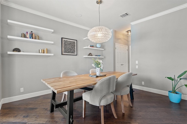 dining area with a notable chandelier, crown molding, and dark hardwood / wood-style floors