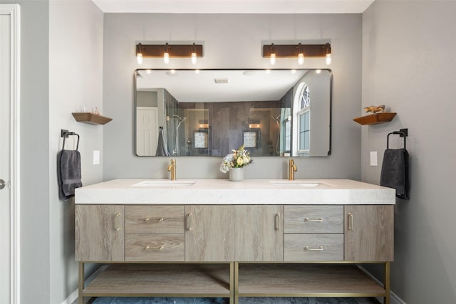 bathroom with a shower and vanity