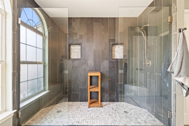 bathroom featuring an enclosed shower