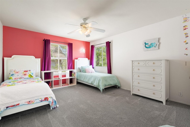 carpeted bedroom with ceiling fan