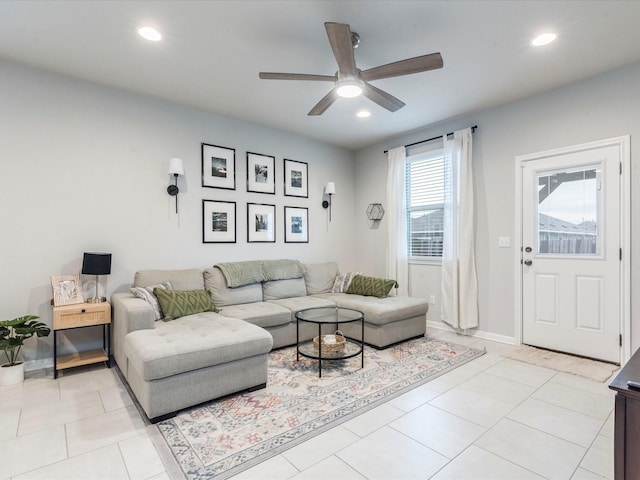 living room with ceiling fan, light tile patterned flooring, and recessed lighting