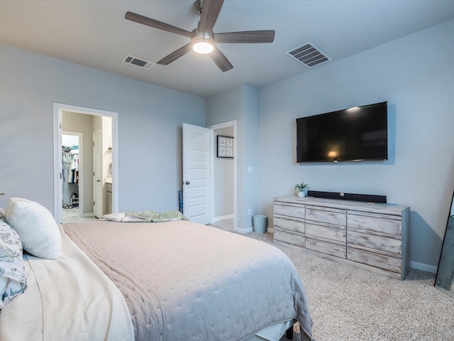 bedroom featuring baseboards, visible vents, and carpet flooring