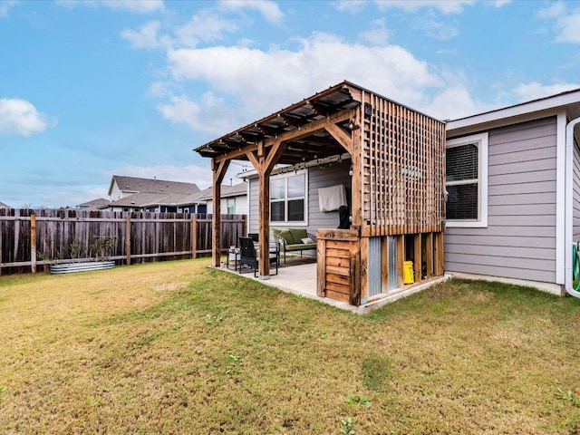 view of yard featuring a patio and fence