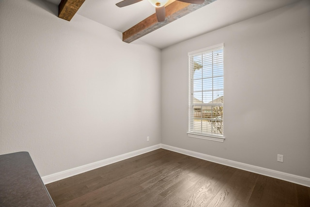 empty room featuring beam ceiling, ceiling fan, and dark hardwood / wood-style floors