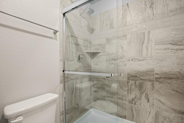 3816 Tango Ct, Leander, TX 78641 - bathroom with toilet and a shower stall