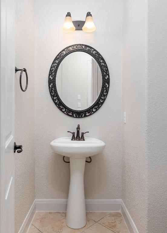 974 Clear Springs Holw, Buda, TX 78610 - bathroom with tile patterned floors and baseboards