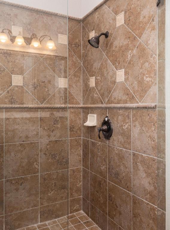 974 Clear Springs Holw, Buda, TX 78610 - full bathroom with a tile shower