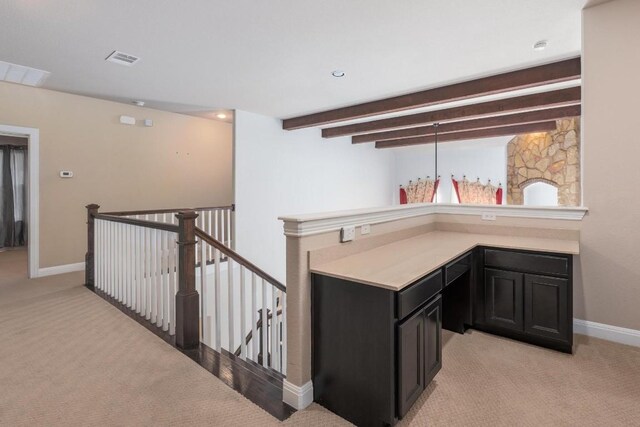 974 Clear Springs Holw, Buda, TX 78610 - bar area featuring light colored carpet, baseboards, and beam ceiling