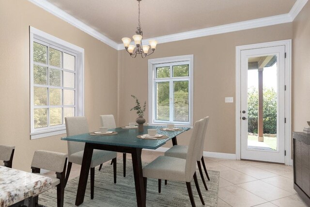974 Clear Springs Holw, Buda, TX 78610 - dining area featuring ornamental molding, a chandelier, light tile patterned flooring, and baseboards