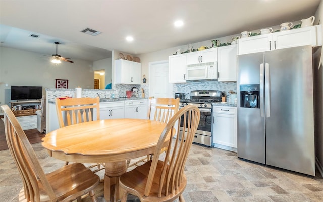 dining area featuring ceiling fan