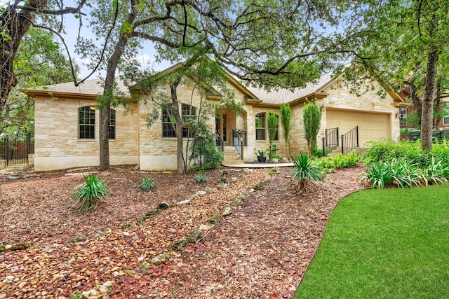 view of front of property featuring a garage