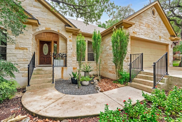 view of exterior entry featuring a garage