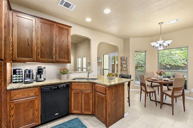 kitchen with kitchen peninsula, dishwasher, hanging light fixtures, a notable chandelier, and sink