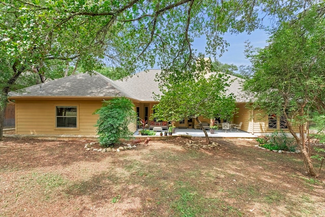 view of front of house with a patio