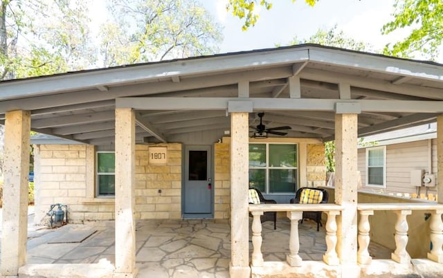 view of patio / terrace featuring ceiling fan