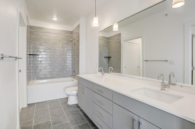 4801 Springdale Rd Unit 2311, Austin, TX 78723 - full bath with shower / bath combination, tile patterned floors, double vanity, and toilet