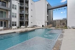 4801 Springdale Rd Unit 2311, Austin, TX 78723 - community pool with a patio