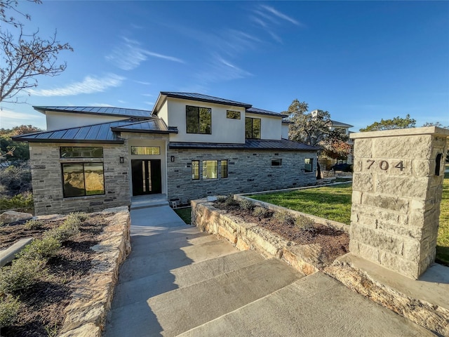 view of front of property with a front lawn