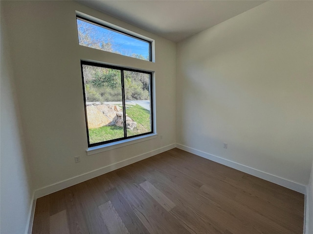 empty room featuring hardwood / wood-style floors