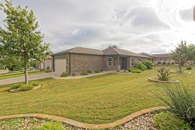 ranch-style house with a garage and a front yard