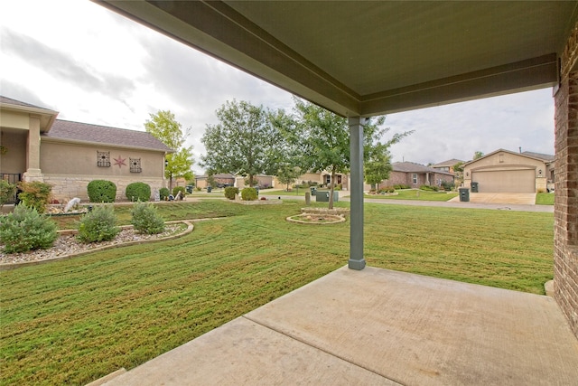 view of yard featuring a garage