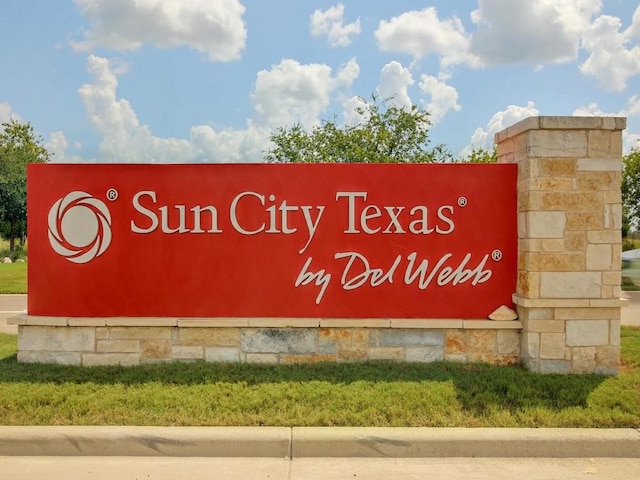 view of community sign