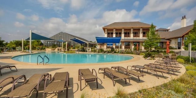 view of pool featuring a patio area