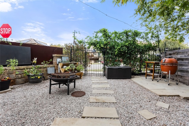 view of patio featuring a fire pit