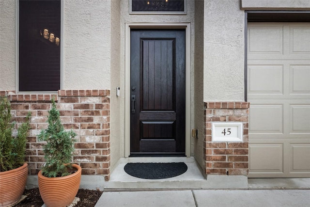 property entrance featuring a garage