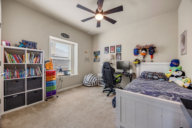 carpeted bedroom featuring ceiling fan