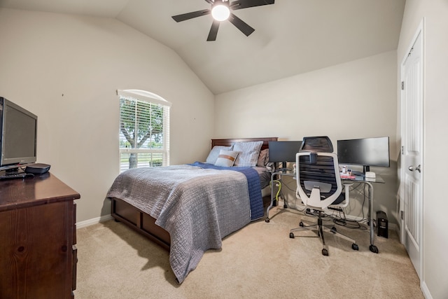 bedroom featuring lofted ceiling, light carpet, and ceiling fan