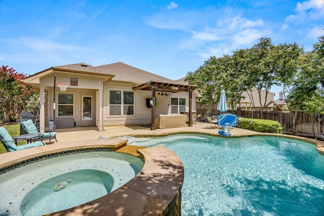 view of pool featuring a pergola, an in ground hot tub, and a patio area