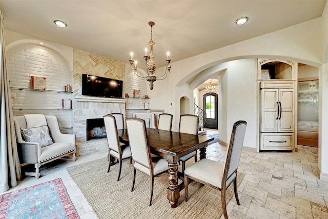 dining space featuring a chandelier